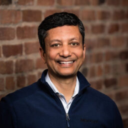 Rajeev Dadoo in a navy quarter zip